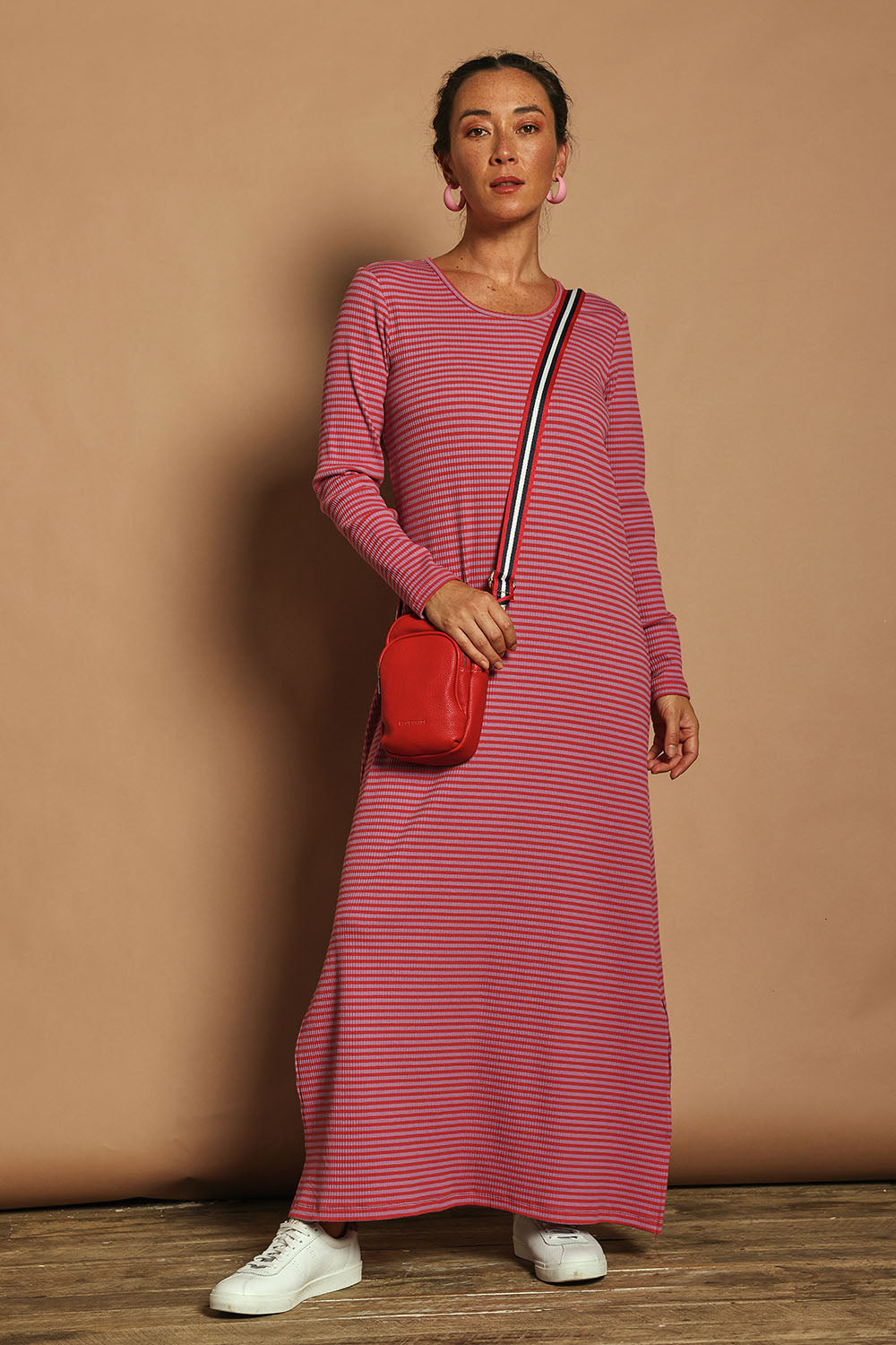Model Katie wearing size 10 of the Cotton Long Sleeve Stripe Dress in colour Redlilac (Red), from the front, showing the whole outfit