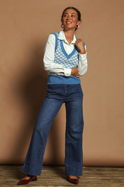 Model Katie wearing size S of the Cotton Blend V Neck Vest in colour Bluewhite (Blue), from the front, showing the whole outfit
