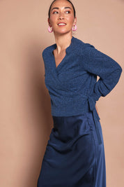 Model Katie wearing size S of the Wrap Knit Sweater in colour Dustyblue (Blue), from the front, cropped image