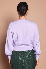Model Katie wearing size S of the Wrap Knit Sweater in colour Lilac (Purple), from the back