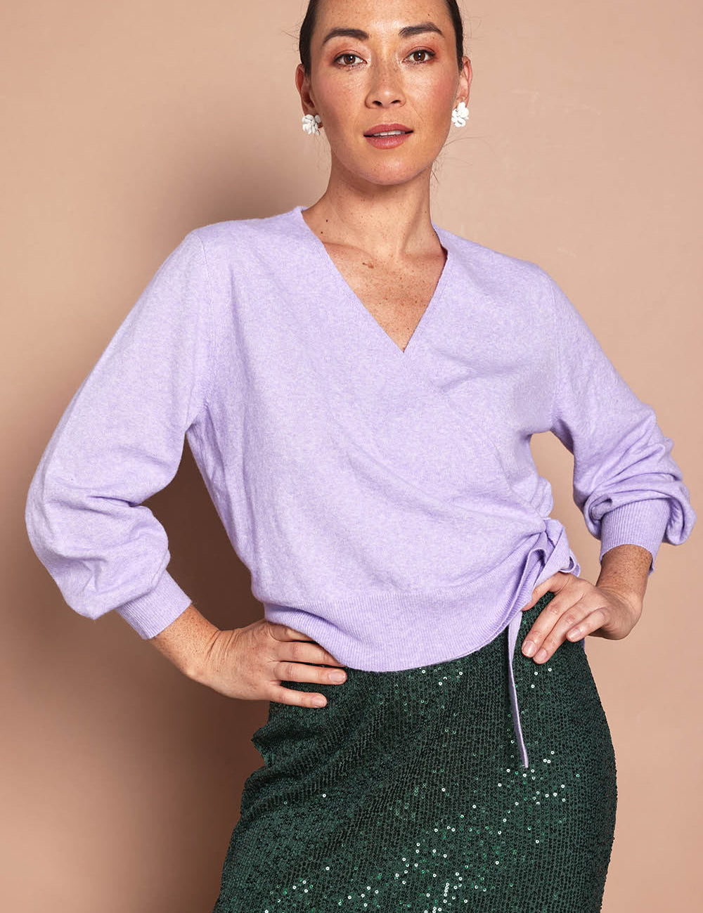 Model Katie wearing size S of the Wrap Knit Sweater in colour Lilac (Purple), from the front, cropped image
