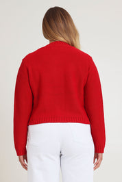 Model Chanel wearing size XL of the Cotton Cardigan in colour Red (Red), from the back