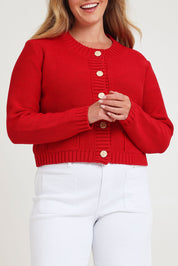 Model Chanel wearing size XL of the Cotton Cardigan in colour Red (Red), from the front, cropped image