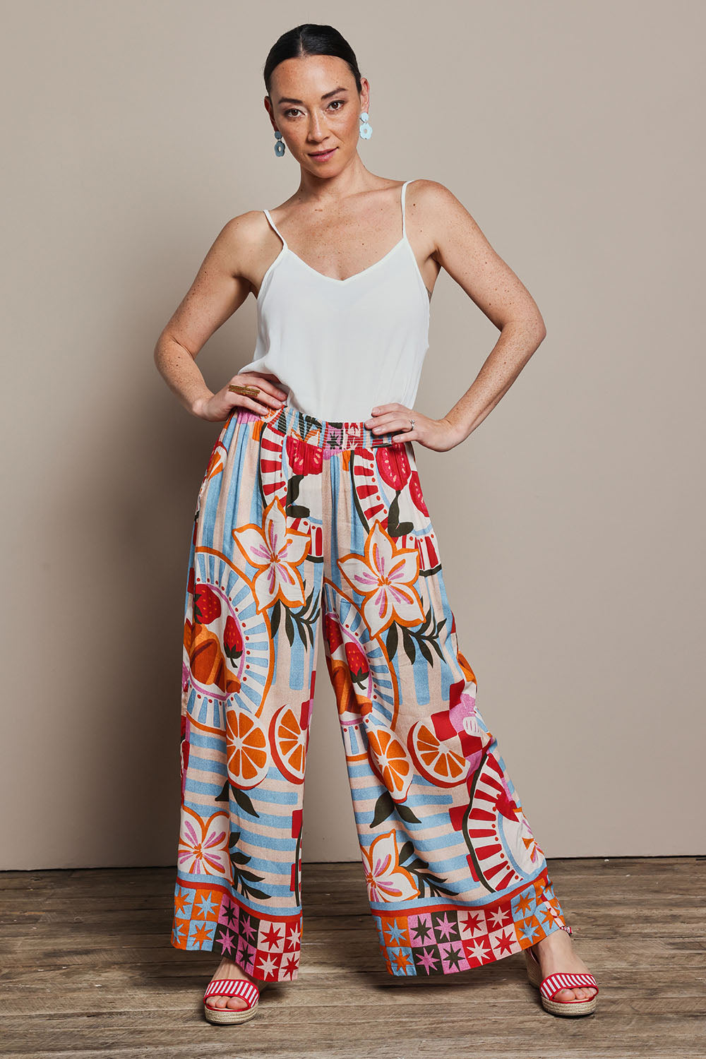 Model Katie wearing size 10 of the Wide Leg Pull On Pant in colour Picnic, from the front, showing the whole outfit