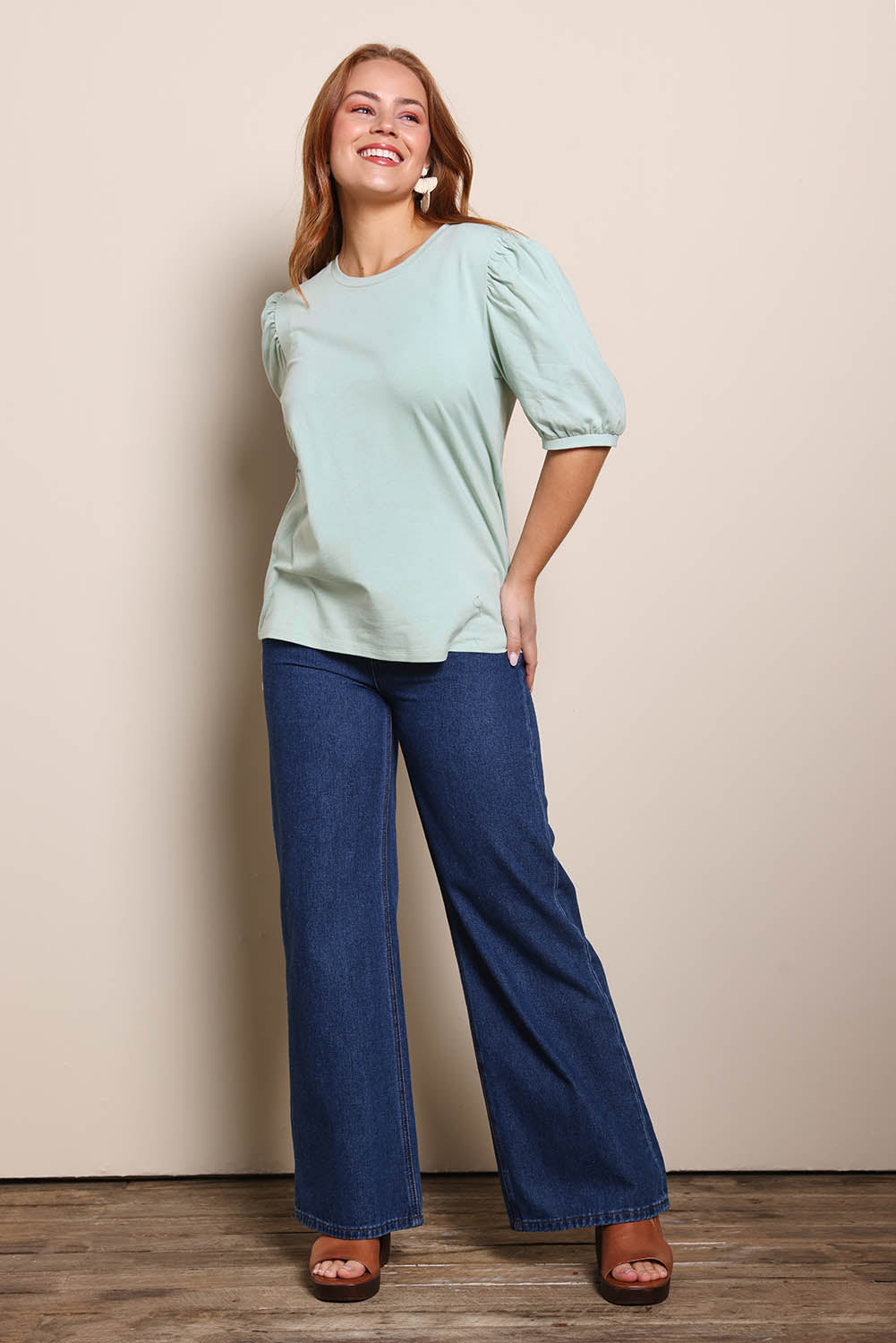 Model Georgiel wearing size 10 of the Cotton Jersey Puff Sleeve Top – Lightsage in colour Lightsage, from the front