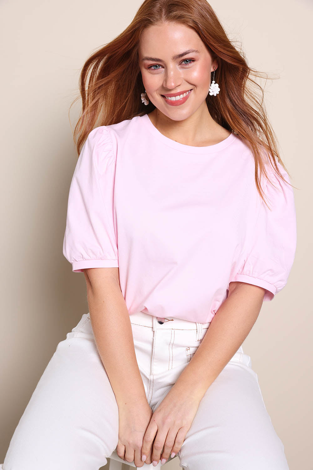 Model Georgiel wearing size 10 of the Cotton Jersey Puff Sleeve Top – Pink in colour Pink, in a cropped view