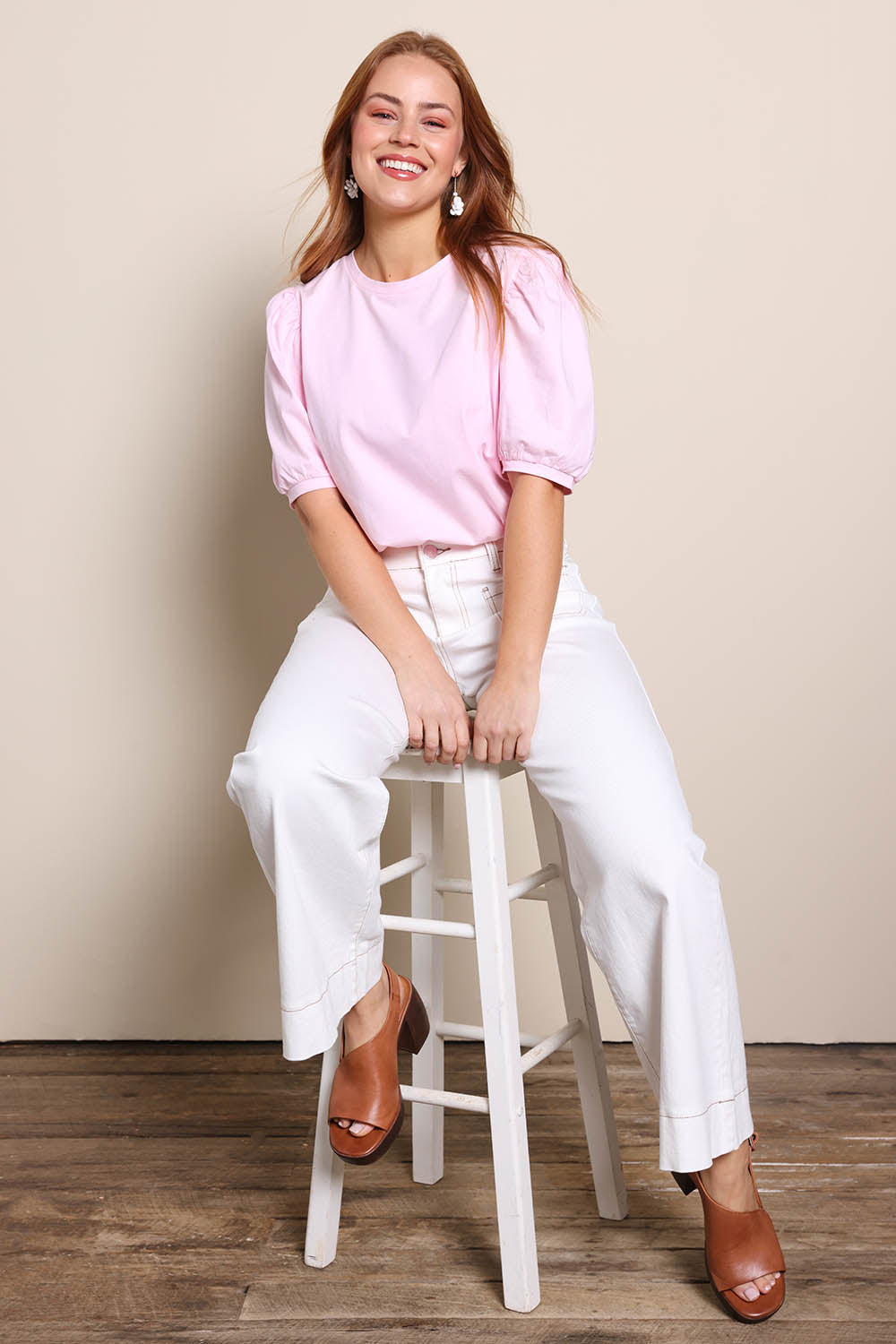 Model Georgiel wearing size 10 of the Cotton Jersey Puff Sleeve Top – Pink in colour Pink, from the front