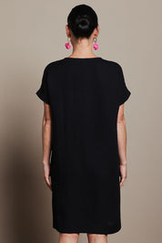 Model Katie wearing size 10 of the Viscose Linen Short Sleeve Dress in colour Black (Black), from the back