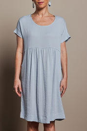 Model Katie wearing size 10 of the Viscose Linen Short Sleeve Dress in colour Dustyblue (Blue), from the front, cropped image