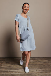 Model Katie wearing size 10 of the Viscose Linen Short Sleeve Dress in colour Dustyblue (Blue), from the front, showing the whole outfit