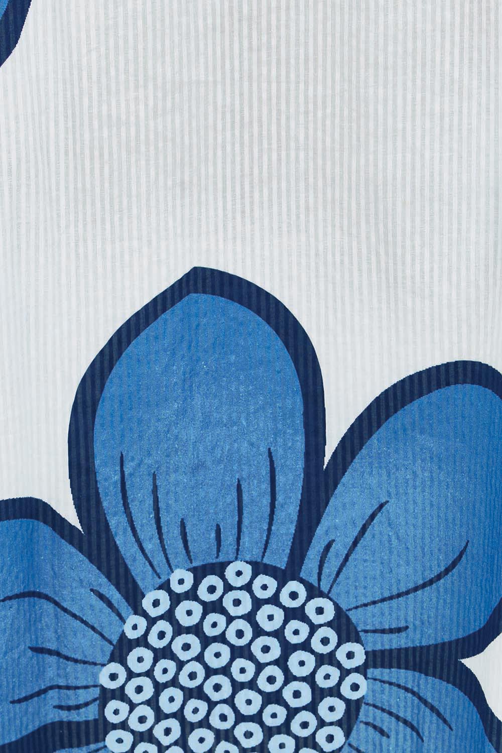 Product shot of the Cotton Flower Skirt – Blue in colour Blue, showing detail