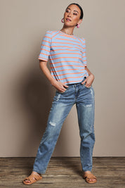 Model Katie wearing size 10 of the Cotton Stripe Puff Sleeve Top in colour Blueorange (Blue), from the front, showing the whole outfit