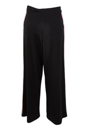 Product shot of the Love Trim Pants in colour Black (Black), from the back