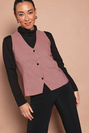 Model Katie wearing size 10 of the Stretch Check Vest in colour Redcheck (Red), from the front, cropped image