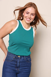 Model Georgiel wearing size 10 of the Cotton Blend Tank Top – Green in colour Green, in a cropped view