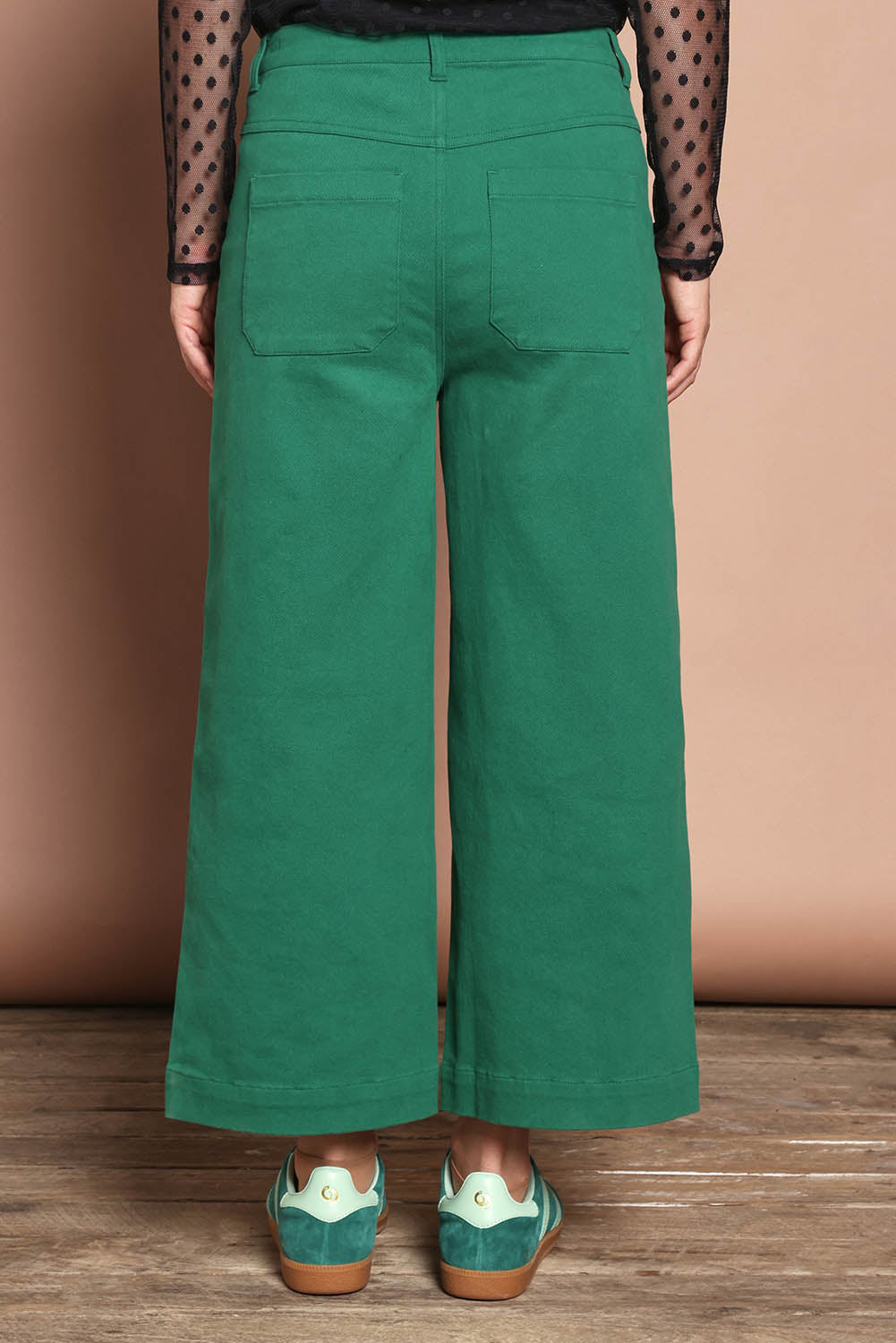 Model Katie wearing size 10 of the Cropped Denim Patch Pocket Jean in colour Green (Green), from the back