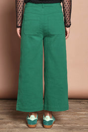 Model Katie wearing size 10 of the Cropped Denim Patch Pocket Jean in colour Green (Green), from the back