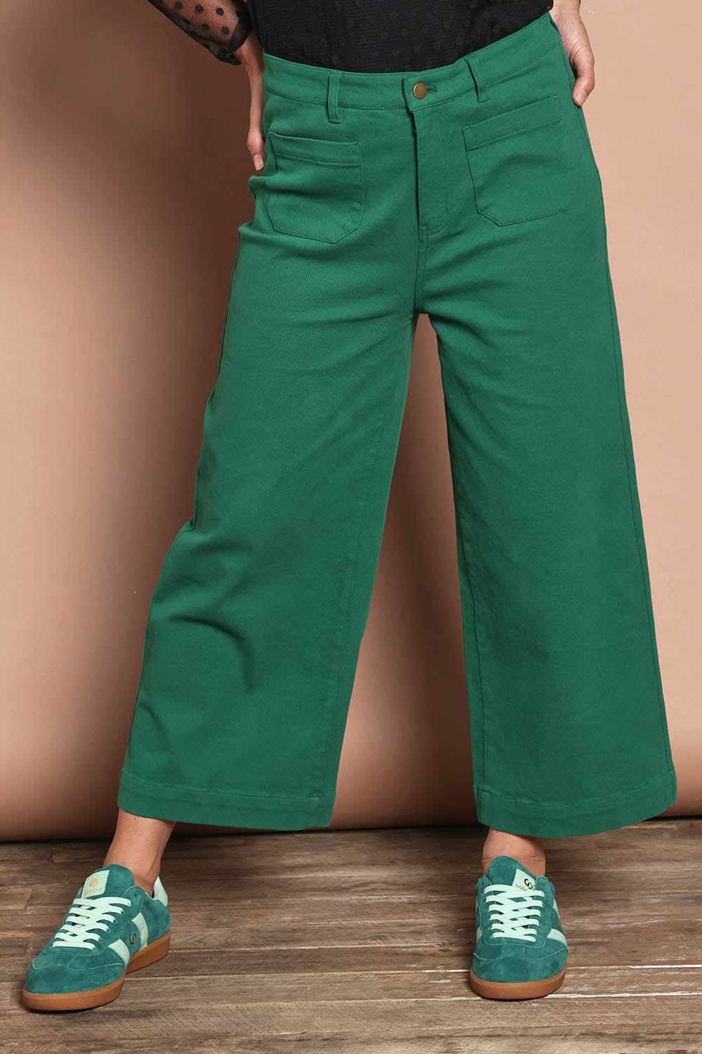 Model Katie wearing size 10 of the Cropped Denim Patch Pocket Jean in colour Green (Green), from the front, cropped image