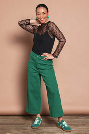 Model Katie wearing size 10 of the Cropped Denim Patch Pocket Jean in colour Green (Green), from the front, showing the whole outfit