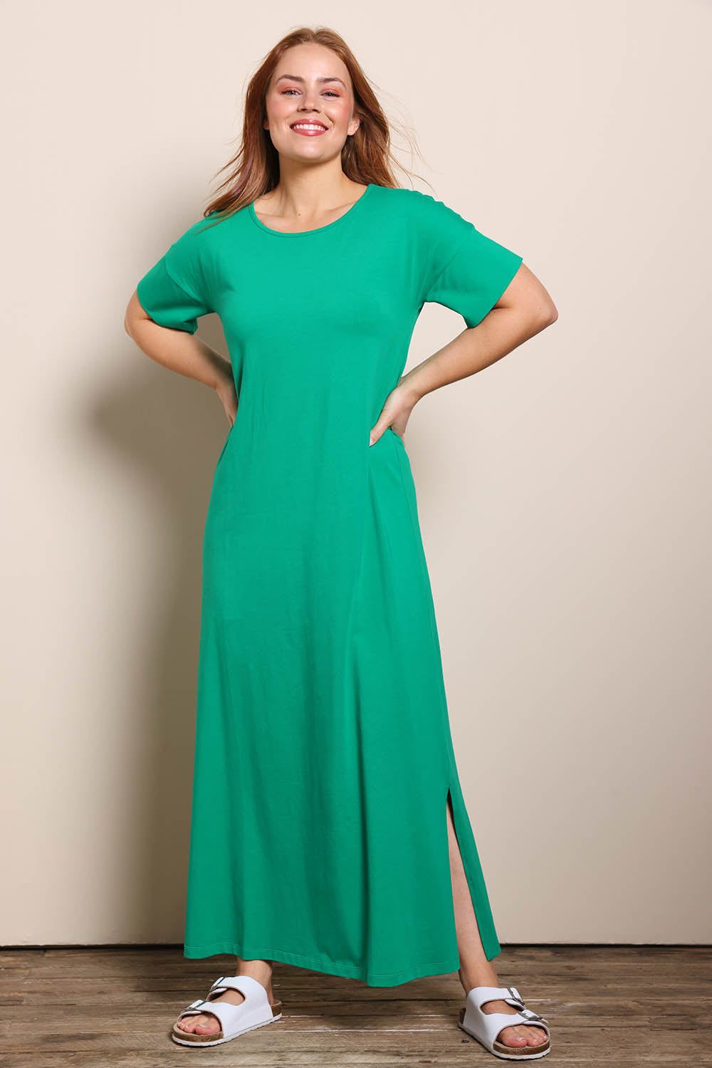 Model Georgiel wearing size 10 of the Cotton Jersey T-Shirt Dress – Green in colour Green, from the front