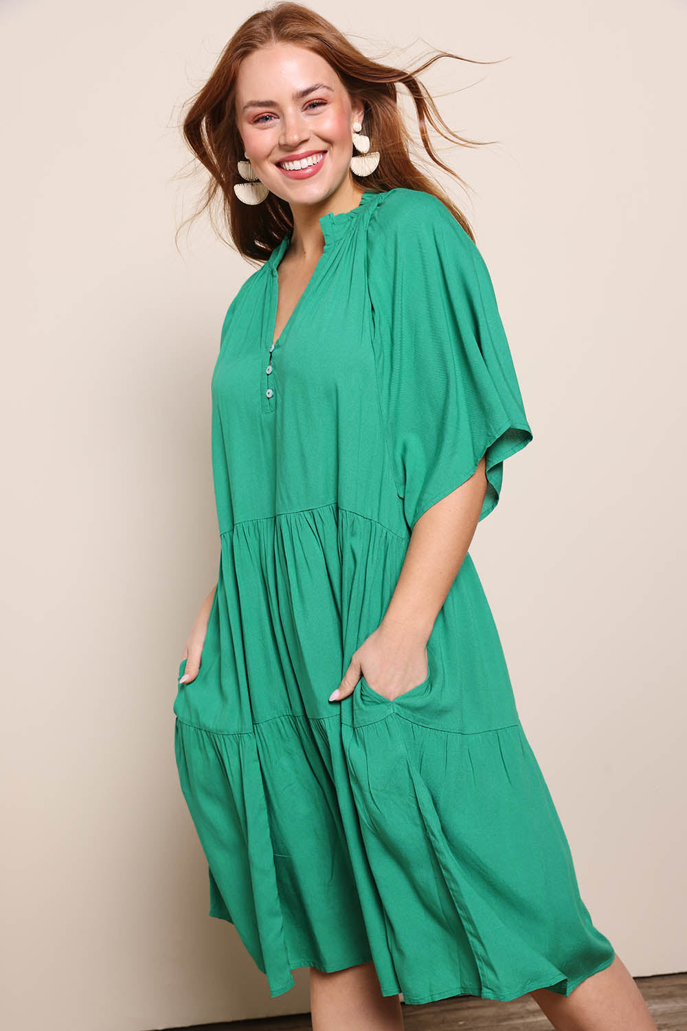 Model Georgiel wearing size 10 of the Relaxed Tiered Dress – Herb in colour Herb, in a cropped view