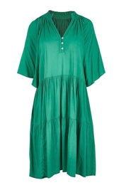 Product shot of the Relaxed Tiered Dress – Herb in colour Herb, from the front