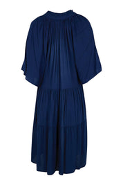 Product shot of the Relaxed Tiered Dress – Peacoat in colour Peacoat, from the back