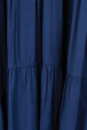 Product shot of the Relaxed Tiered Dress – Peacoat in colour Peacoat, showing detail