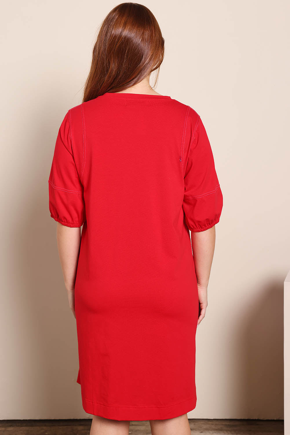 Model Georgiel wearing size 10 of the Cotton Jersey Relaxed Dress – Red in colour Red, from the back