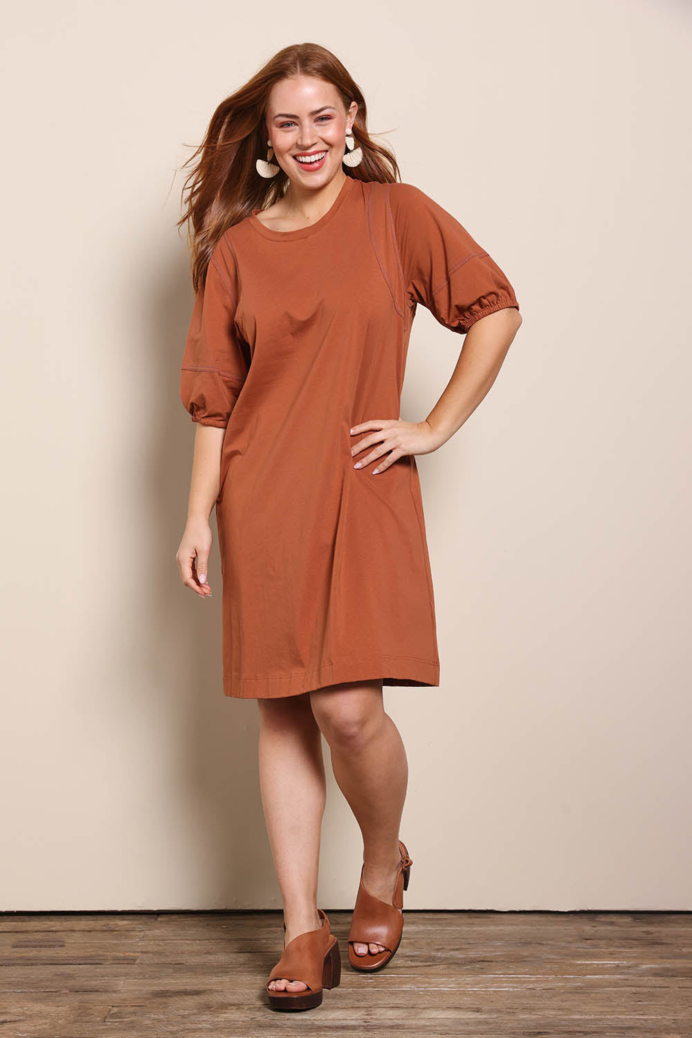 Model Georgiel wearing size 10 of the Cotton Jersey Relaxed Dress – Toffee in colour Toffee, from the front