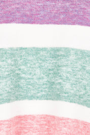 Product shot of the Mock Neck Tunic in colour Sunrise, detail
