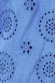 Product shot of the Lauren Eyelet Dress in colour Amparoblue (Blue), detail
