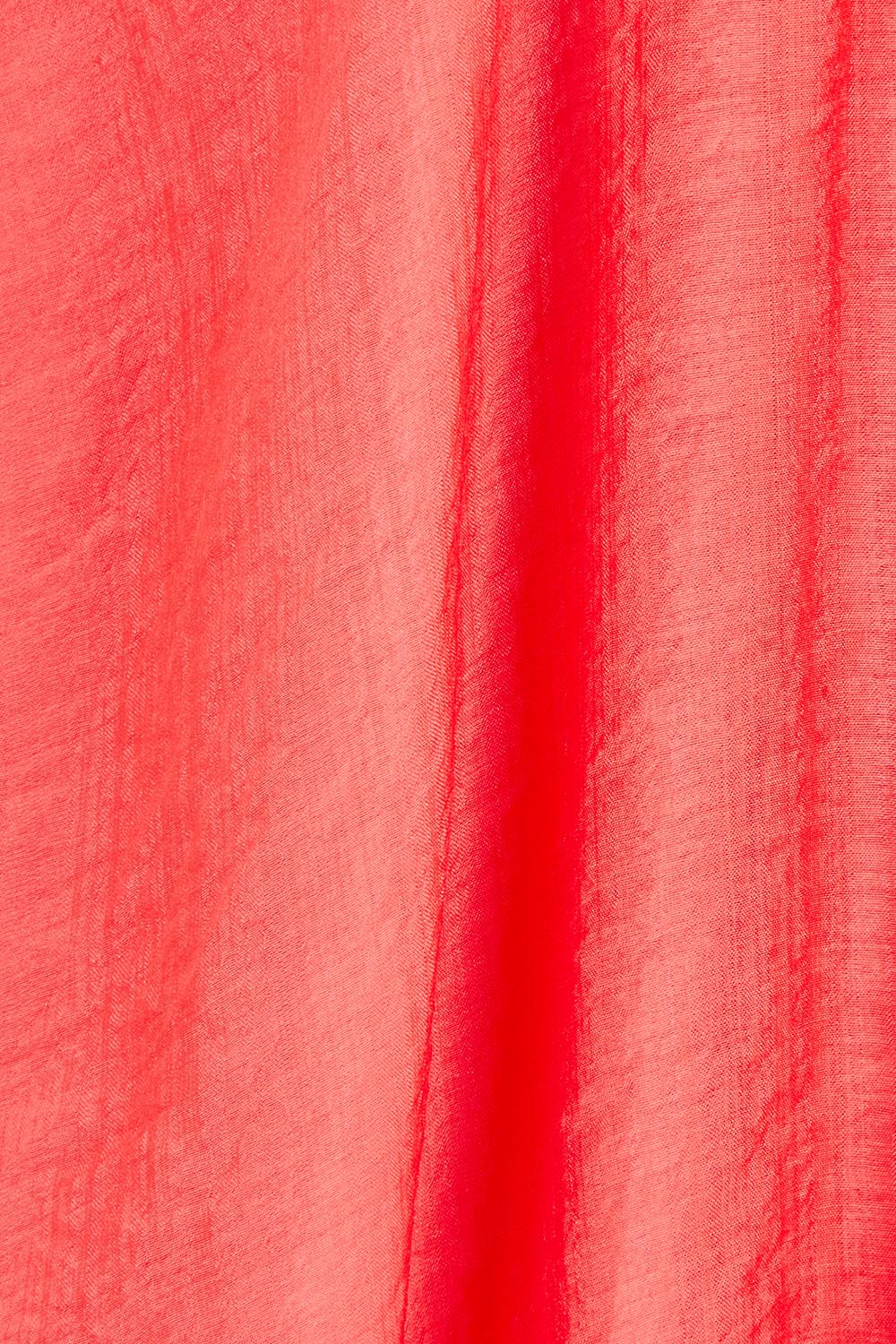 Product shot of the Baja Dress in colour Punch (Red), detail