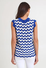 Model Madeline wearing size S of the Jamaica Cotton Knit Top in colour Azul, from the back