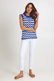 Model Mae wearing size S of the Jamaica Cotton Knit Top in colour Azul, from the front, showing the whole outfit