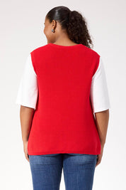 A model wearing the Alaska Knit Vest in colour Red (Red), from the back