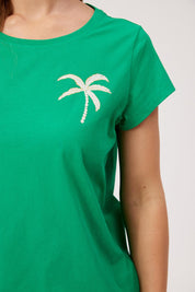 Model Genericm wearing size sample of the Congo Graphic Tee – Green in colour Green, in a cropped view