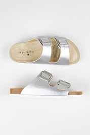 Model Genericm wearing size sample of the Ibiza Slide - Silver in colour Silver, from an angle