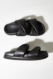 A model wearing size 37 of the Tactful Flat in colour Black (Black), from the front, showing the whole outfit
