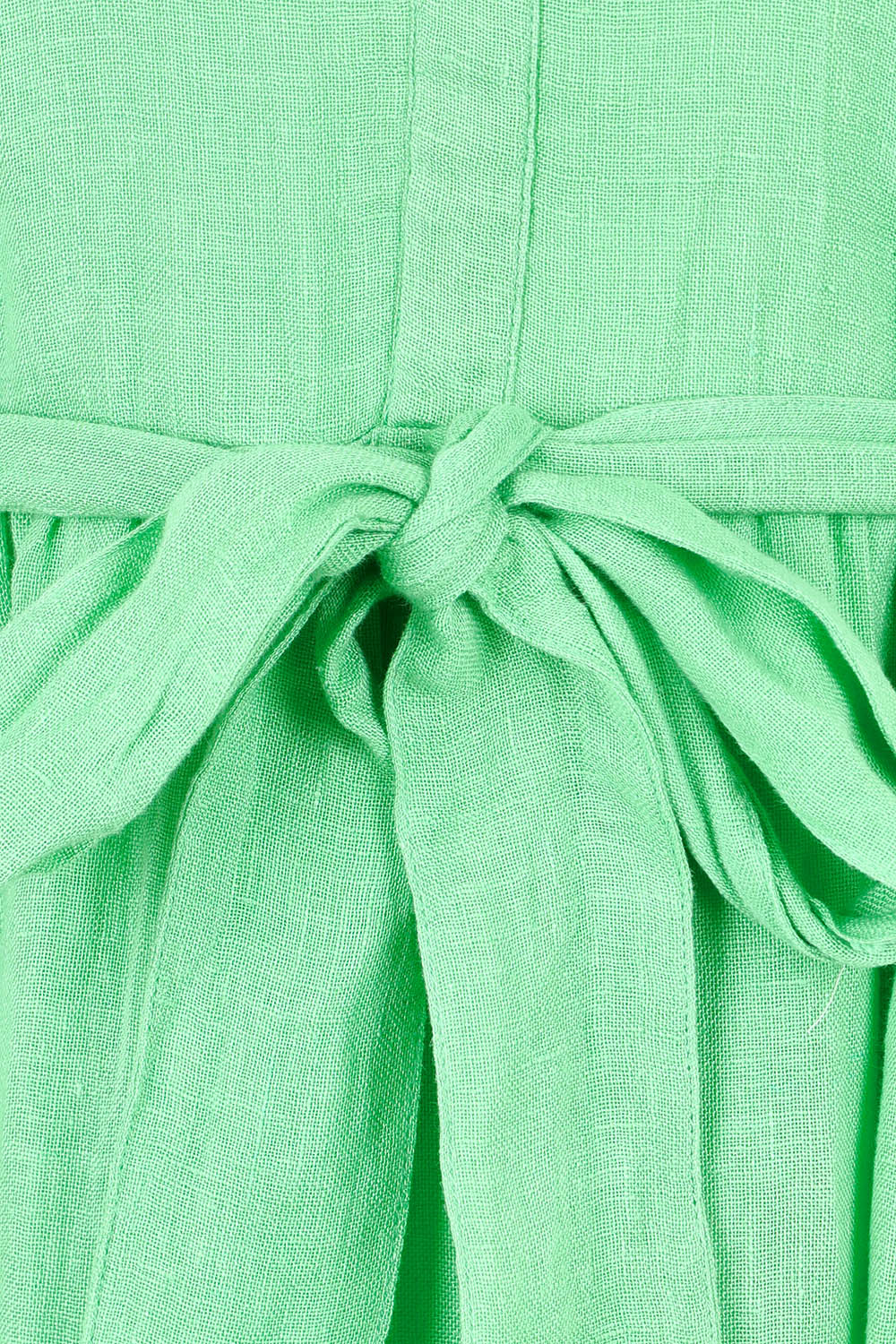 Product shot of the Lynwood Linen Dress in colour Apple (Green), detail