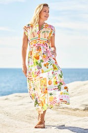 Model Bianca wearing size S of the Avery Cotton Maxi Dress in colour Tropical, from the front, showing the whole outfit