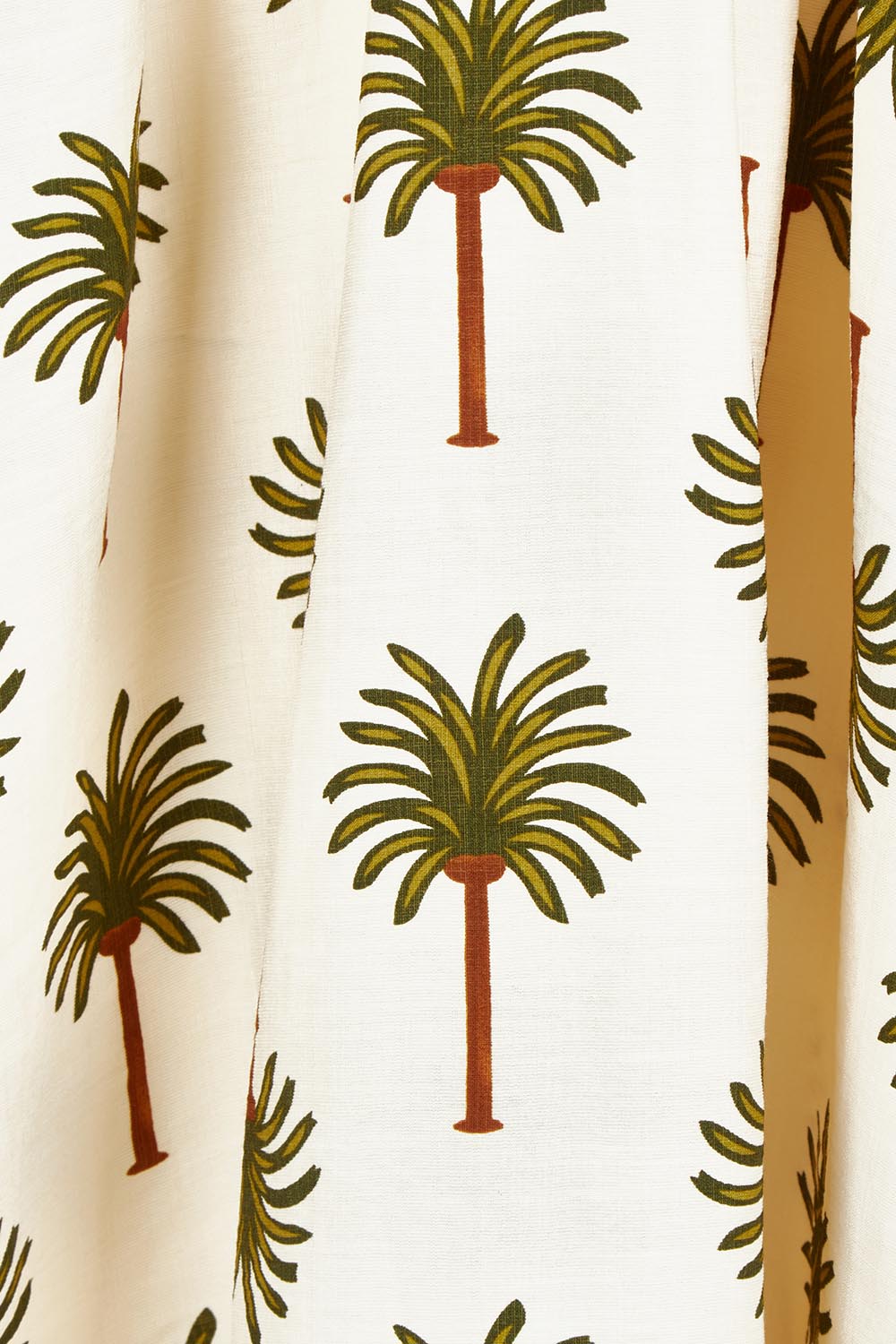 Product shot of the Alfina Dress in colour Ivorypalm, detail