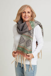 Model Sandy wearing size OneSize of the Vancouver Scarf in colour Natural, from the front, showing the whole outfit