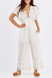 Model Chesska wearing size S of the Blackpool Jumpsuit in colour White (White), from the front, cropped image