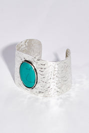 A model wearing size OneSize of the Samira Bracelet in colour Aqua (Metallics), from the front, showing the whole outfit
