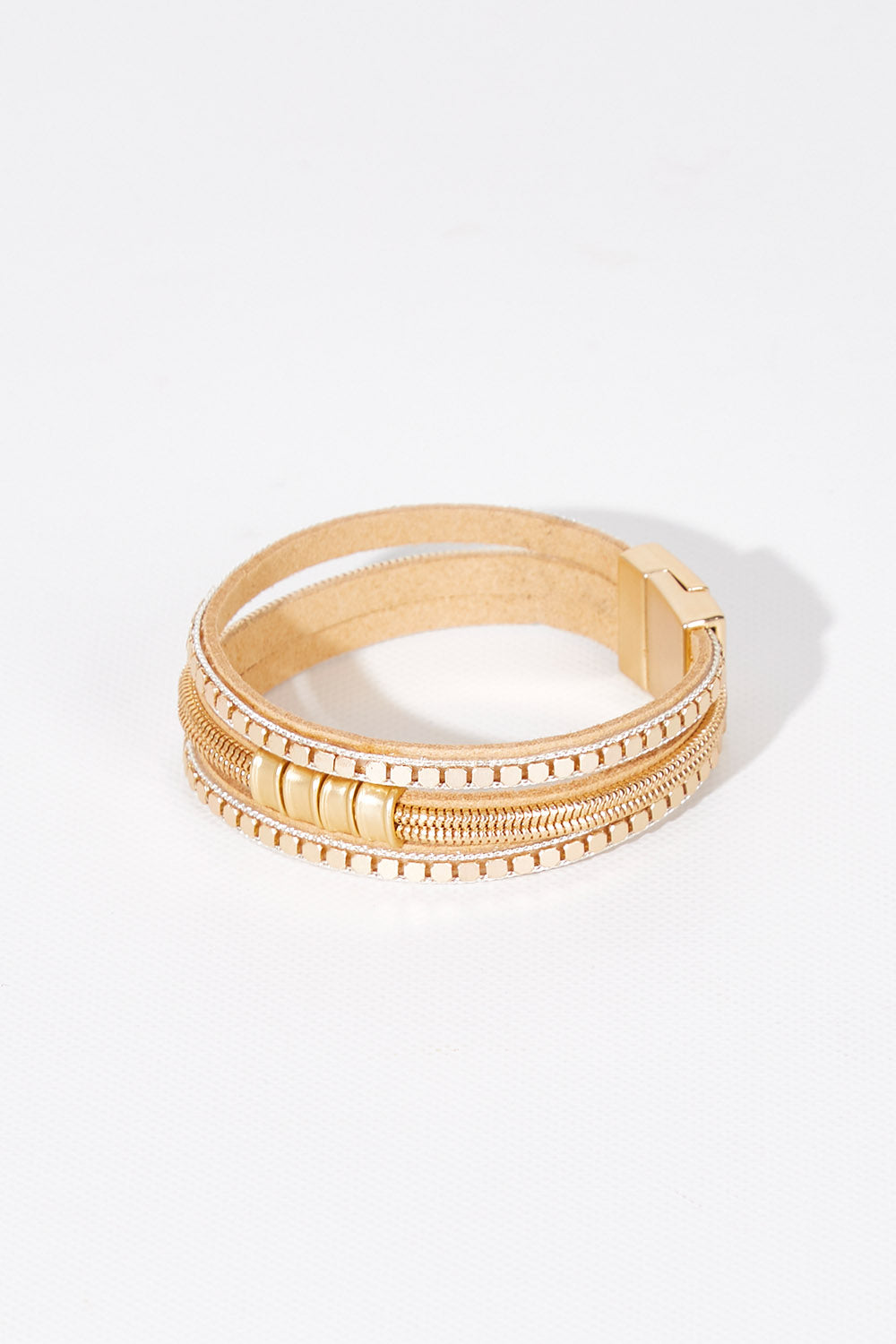 A model wearing size OneSize of the City Scape Bracelet in colour Gold (Metallics), from the front, showing the whole outfit