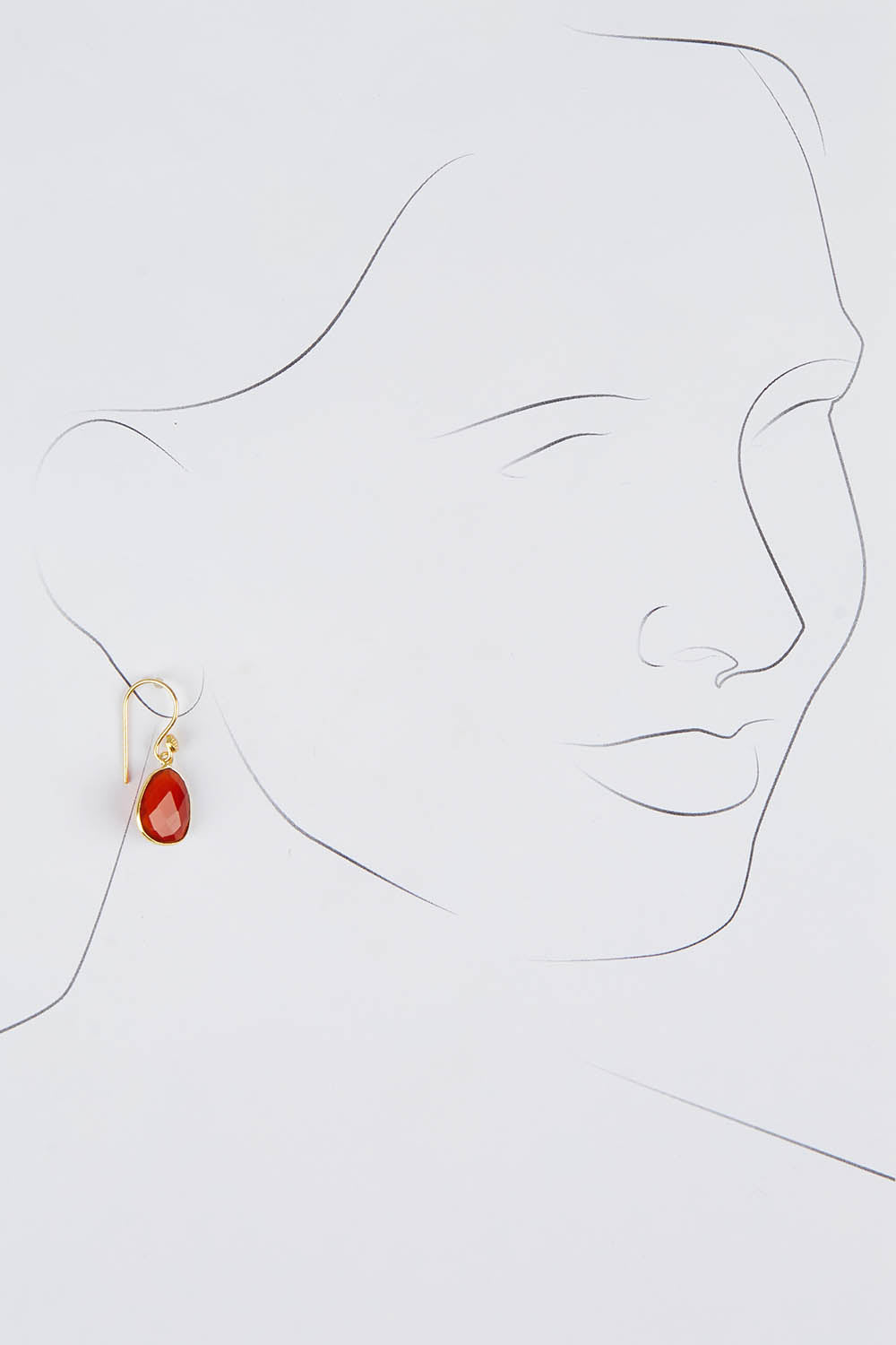 A model wearing size OneSize of the Carrie Earrings in colour Ruby (Red), from the front, showing the whole outfit