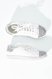 A model wearing size 6 of the Stardust Sneaker in colour White (White), from the front, showing the whole outfit