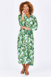 Model Summer wearing size S of the Patsy Dress in colour PapBlue (Blue), from the front, showing the whole outfit