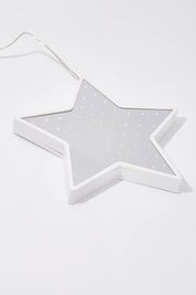 A model wearing size OneSize of the Infinity Light Hanging Christmas Star in colour White (White), from the front, showing the whole outfit